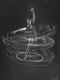 Multiple Exposure of a Woman Playing with a Hula Hoop