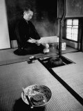 Old Monk Sitting in Cell Meditating and Performing Tea Ceremony