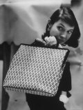 Model Displaying a Printed Leather Handbag