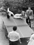 Two 15 Year Old Girls Teamed Up as Partners Playing Game Outdoors During Party