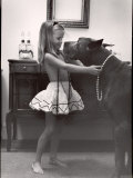 Model Posed Putting Costume Jewelry on Great Dane  Children's Fall Fashion