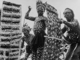 Natives with Painted Faces During Dance