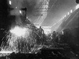 Men Working in an Iron Works Plant