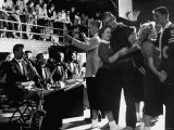 Teenage Couples Without Shoes Dancing at Carlsbad High School Sock Hop