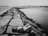 Senator Edward M Kennedy Taking a Sunbath on Breakwater Near His Summer Home