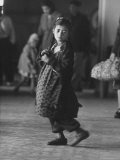 Young Girl Standing in Airport Terminal