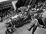 People Riding a Merry Go Round  During the Celebration of Munich's 800th Anniversary