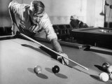 Scene from a Small Town Pool Hall  with a Man About to Take a Shot
