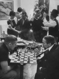 Men Playing Chess at a Cocktail Party