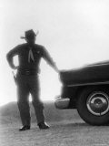 Nevada Sheriff Standing Against the Light from an Atomic Blast 40 Miles Away