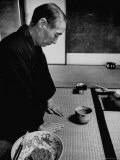 Old Monk Sitting in Cell Meditating and Performing Tea Ceremony