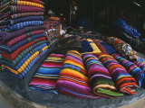 Colorful Blankets Fill a Street-Side Stall