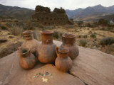 Wari Indian Vessels and Beads with Wari Ruins in the Background