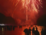 Fourth of July Fireworks over Tourists Wading in the Reflecting Pool