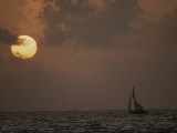 A Cat Boat Takes a Sunset Cruise About the Miskito Cays
