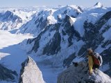 A Man Enjoying the Breathtaking View from Mount Combatant
