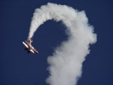 A Sharply Banking Bi-Plane at the Oshkosh Fly-In Air Show