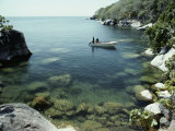 A Small Motorboat in a Lake Malawi Cove