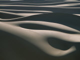 The Light Casts a Luminous Glow over the Sand Dunes of the Sahara