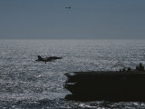 A Jet Comes in for a Landing on an Aircraft Carrier