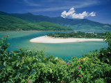 Elevated View of a Sandy Strip of Land with White Beaches and Emerald Waters