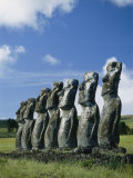 Row of Moai under a Clouded Sky