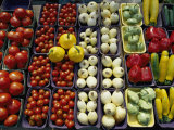 Colorful Vegetables in Paperboard Baskets Line a Table