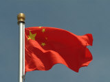 The Chinese National Flag Waves Above Tiananmen Square