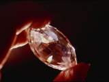 A Huge Nine-Carat Diamond Glistens with Light