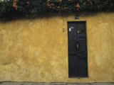 A Detail of a Wall with a Numbered Door