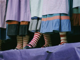 A View of People Wearing Striped Stockings