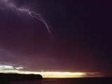 A Bolt of Lightning Crosses a Stormy Sky