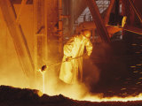 View of a Steel Worker Working in Protective Clothing