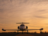 Twilight View of a Lear Jet on the Runway