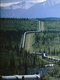 The Trans-Alaska Pipeline Cuts Through Wilderness Towards Mountains