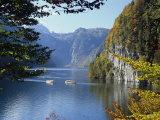 Two Boats Take a Scenic Trip Through a Mountain Valley of Fall Colors