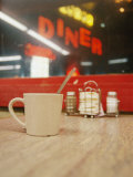 A Coffee Cup and a Diner Sign Spell Late Night Just off Route 95