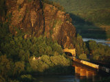 A Train Enters a Tunnel from a Railroad Bridge Over the Potomac River