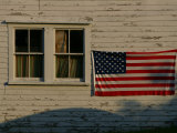 Evening Light on an American Flag on the Side of an Old Barn