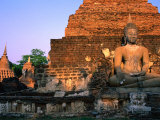 Serene Buddha and Ancient Ruins at Wat Mahathat  Sukhothai Historical Park  Sukhothai  Thailand