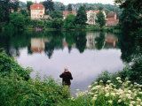 Man Fishing in Lake in In Oliwa  Gdansk  Poland