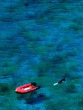 Spearfisher and His Boat  New Caledonia