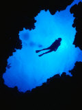 Diving off Limestone Platform into Blue Hole at Bat Cave  Gene's Bay  Bahamas