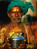 Pilgrim with Offerings to Give to Deities at Sri Meenakshi Temple  Madurai  India