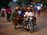 Motorcycle Carrying Produce and People to Bavel  Battambang  Cambodia