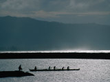 Fishermen Paddle an Outrigger in Wailua Bay on the North Shore of Oahu  Haleiwa  Hawaii  USA