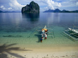Bangka (Boat) Leaves Shores of Malapacao Island  Bacuit Archipelago  Palawan  Philippines