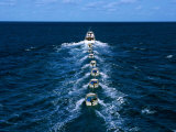 Torres Strait Fishing Boat Towing Seven Dories (Small Dinghies)  Australia