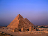 Pyramids Mycerinus  Chephren and Cheops at Giza with Cairo Suburbs in Background  Giza  Egypt