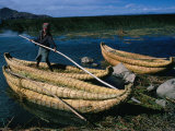 Aymara Boy on Reed Boat on Lake  Lake Titicaca  Puno  Peru
